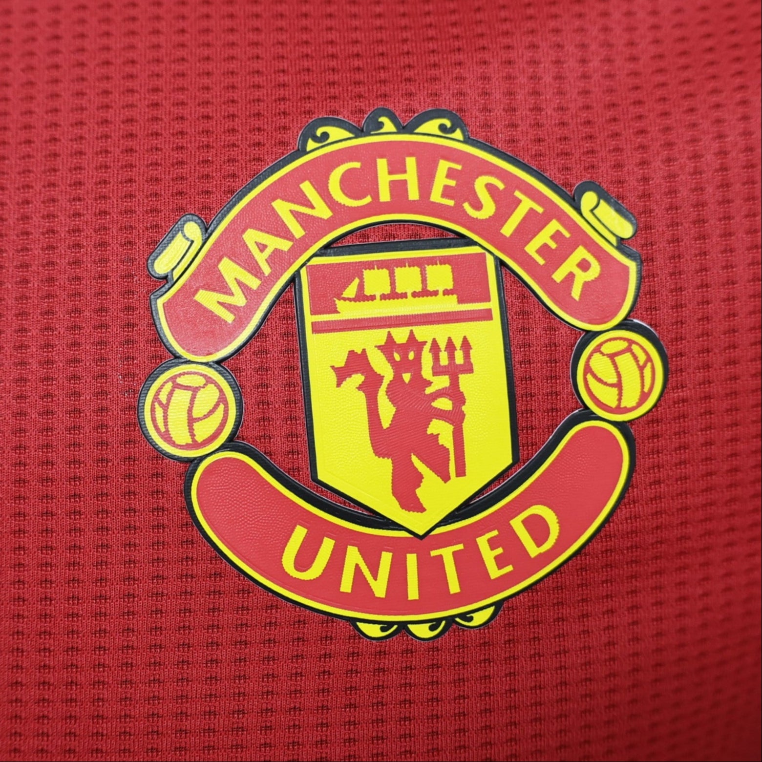 Versión de jugador de manga larga local del Manchester United 24/25